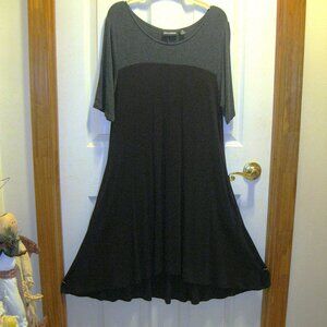 Nina Leonard M Black Jersey Dance Swing Dress Flowy SS Pockets Assymetric Hem